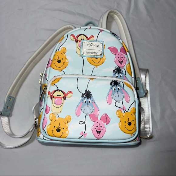 Loungefly Handbags - Loungefly Disney mini Backpack - Light Blue with Winnie the Pooh Characters